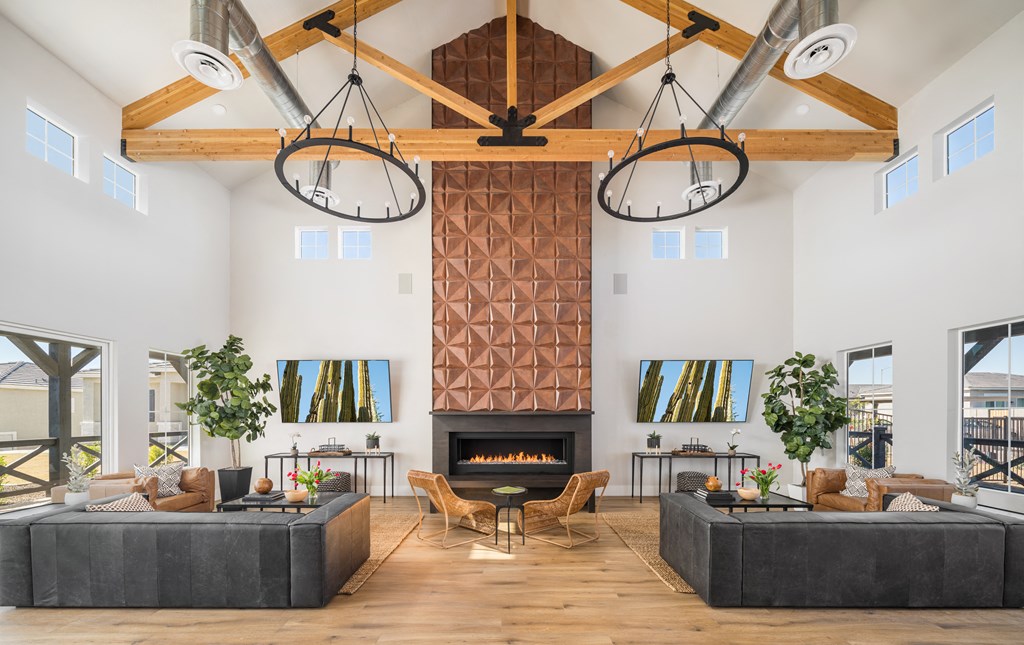 a rendering of a living room with couches and chairs in front of a fireplace