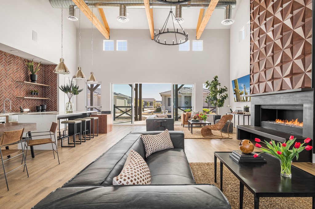 a living room filled with furniture and a fire place