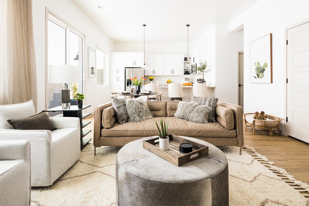 a living room with a couch and a table