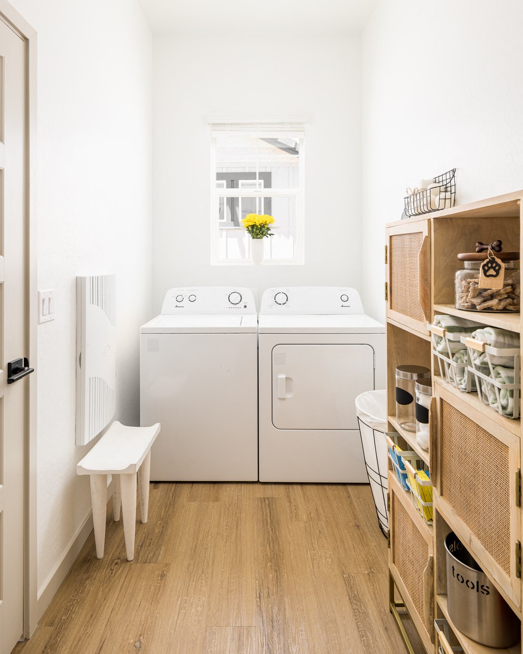 a small laundry room with a washer and dryer