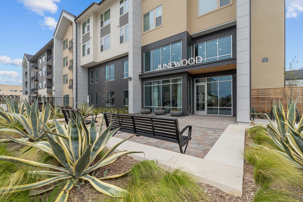 A building with the name Junewood on it.