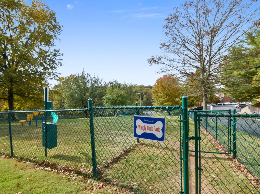 a fence with a sign that says fun park on it