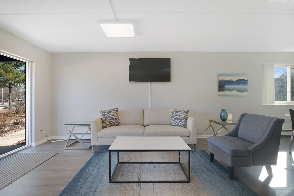 a living room with a couch and a coffee table