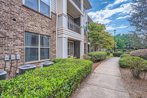 A building with a walkway in front of it.