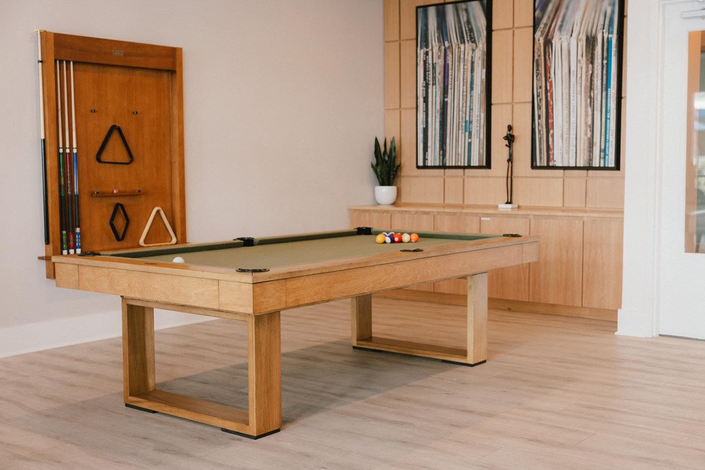 a billiards table in a living room