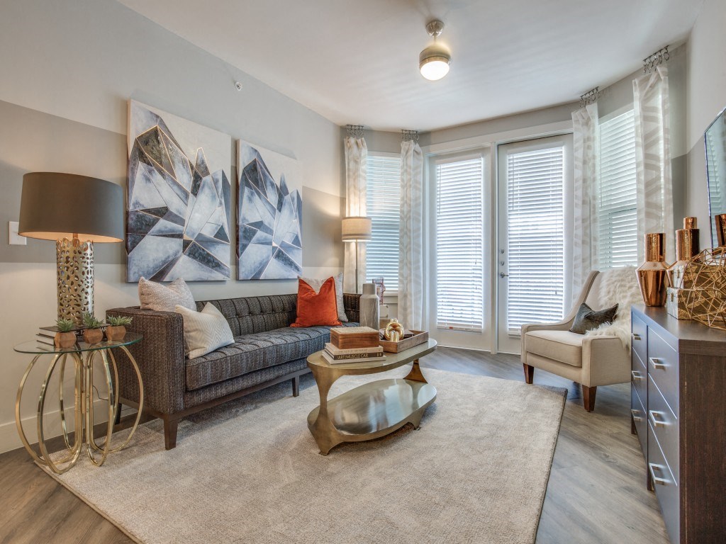 a living room with a couch and a table