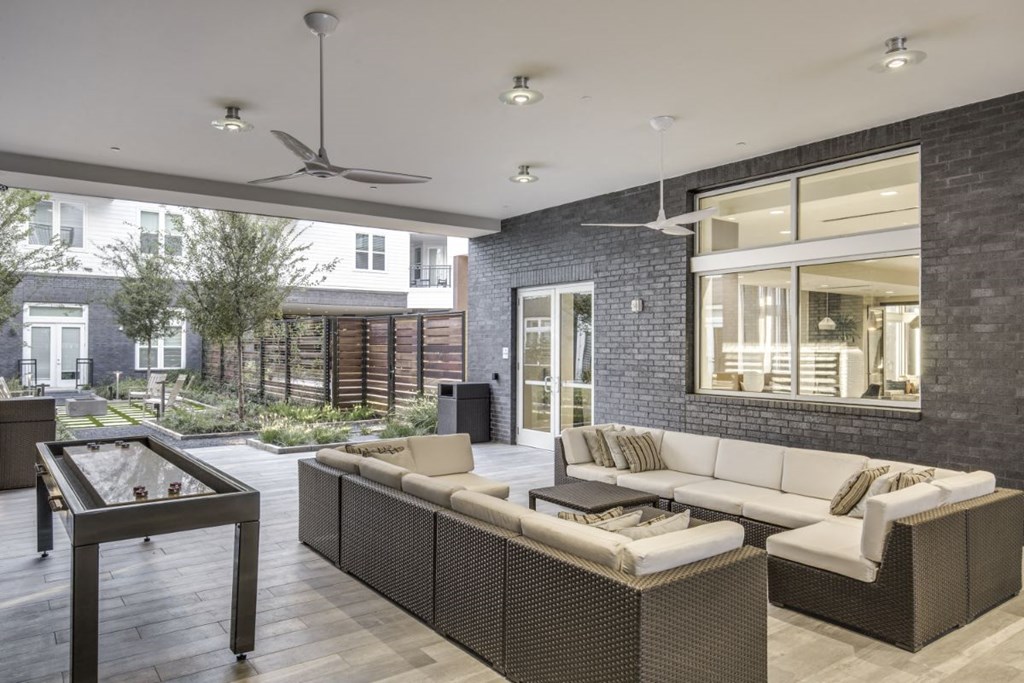 a living room with a couch and a table