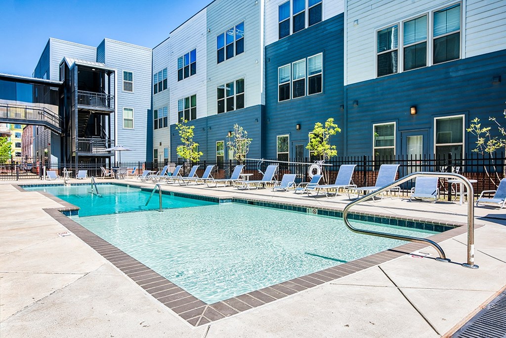 our apartments have a resort style pool with lounge chairs
