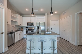 Model Apartment Home Kitchen and Island - Photo Gallery 3