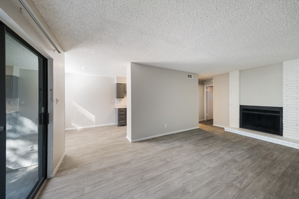 hardwood floors with huge fireplace