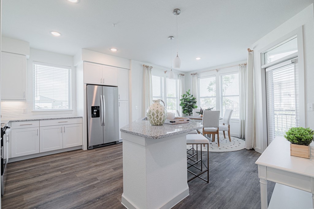 a kitchen and dining area in a new home