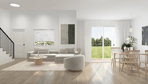 A modern living room with a white sofa set and a wooden coffee table.