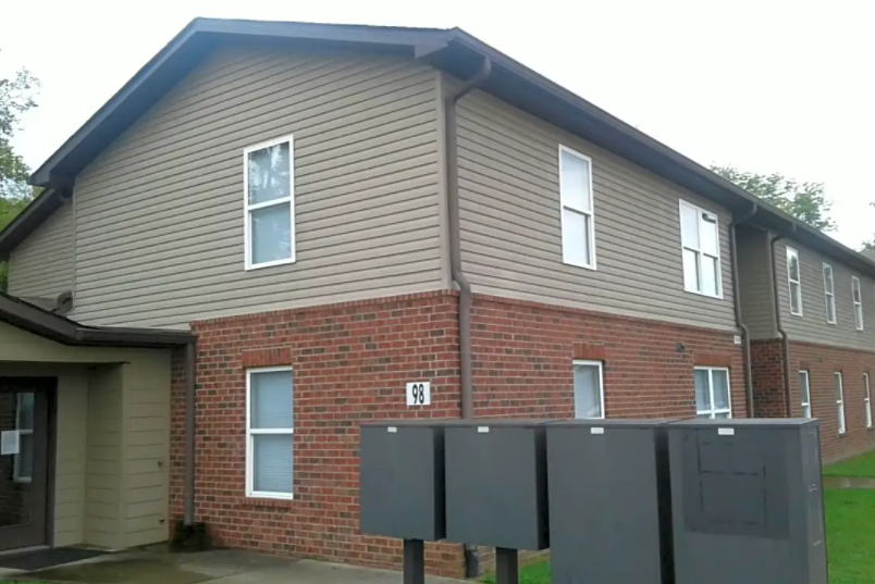 a house with a mailbox in front of it
