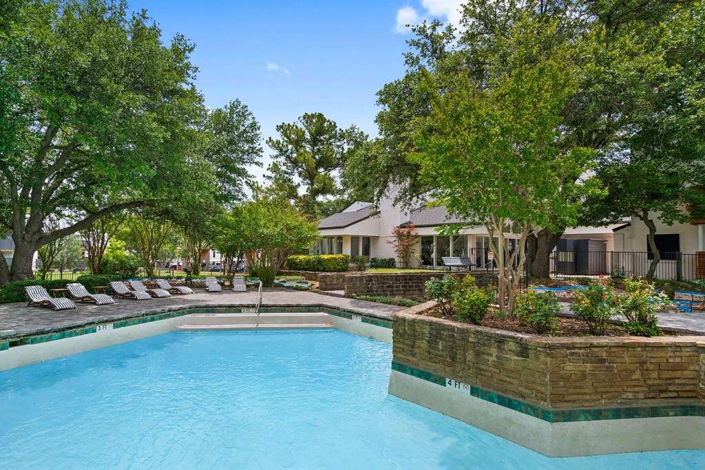 the swimming pool at the estates apartments