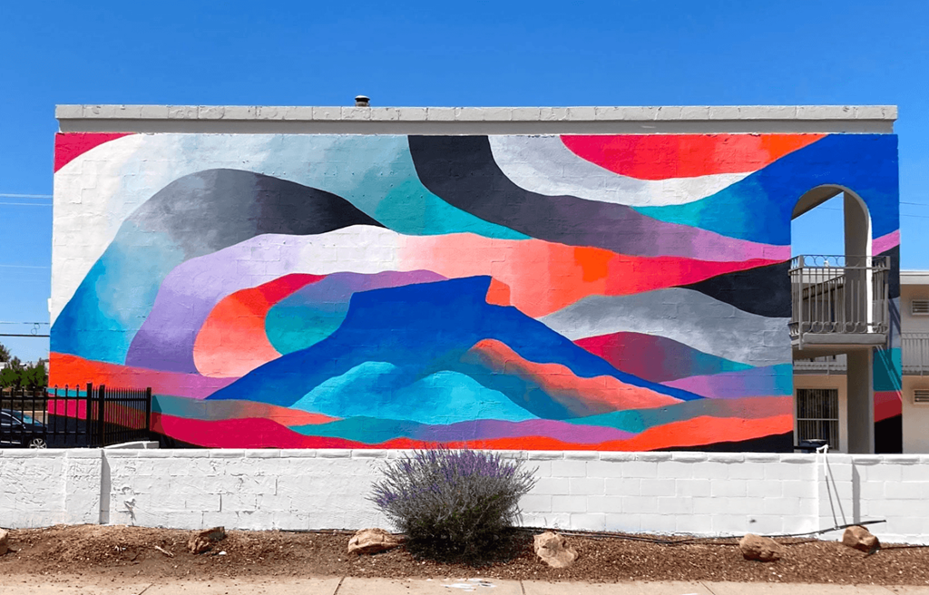 a mural painted on the side of a building