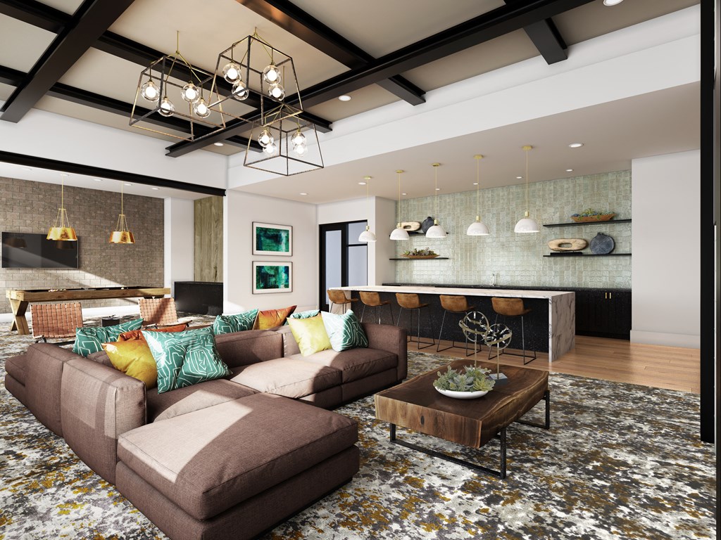 a living room with a brown couch and a coffee table