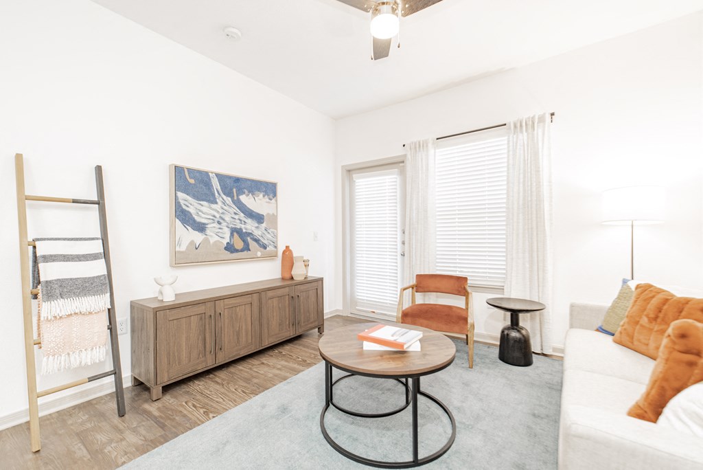a living room with a couch and a table