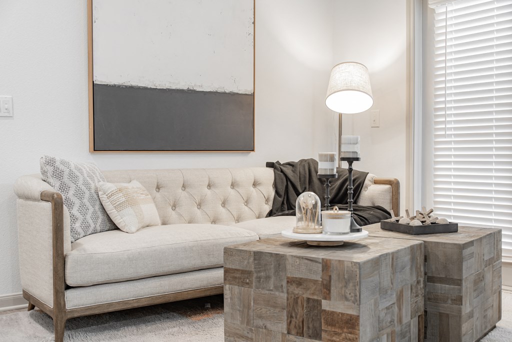 a living room with a couch and a coffee table