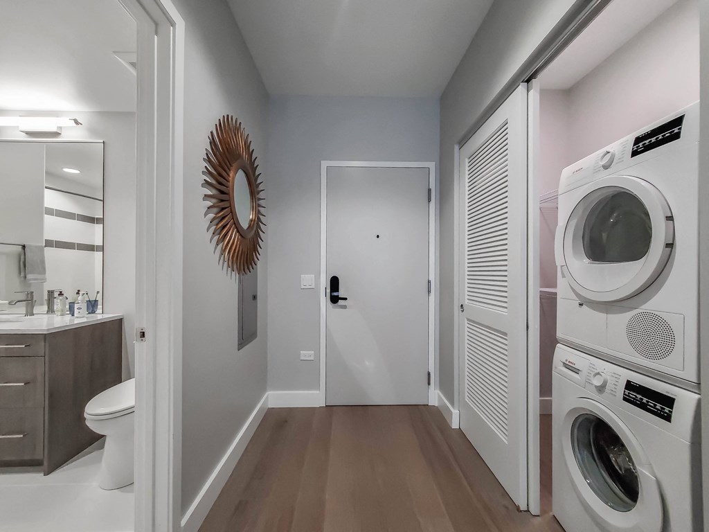 A laundry room with a washer and dryer.