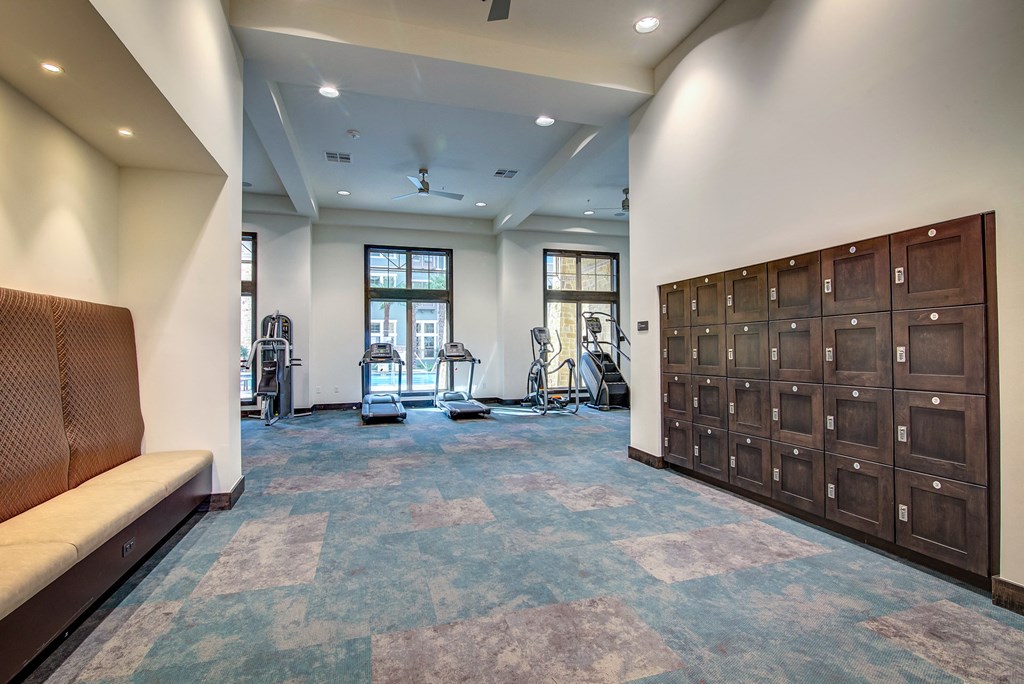 the reserve at bucklin hill fitness room with weights and stationary bikes