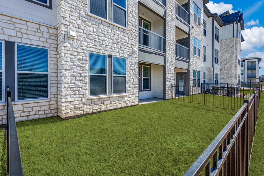 our apartments offer a spacious courtyard with grass