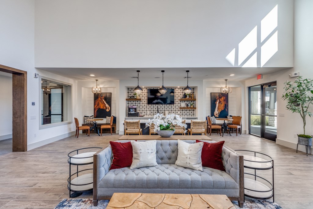 a living room with a couch and a table