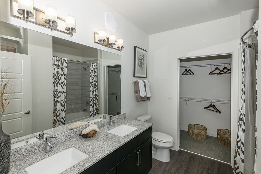 Bathrooms with dual vanities in select homes. - Photo Gallery