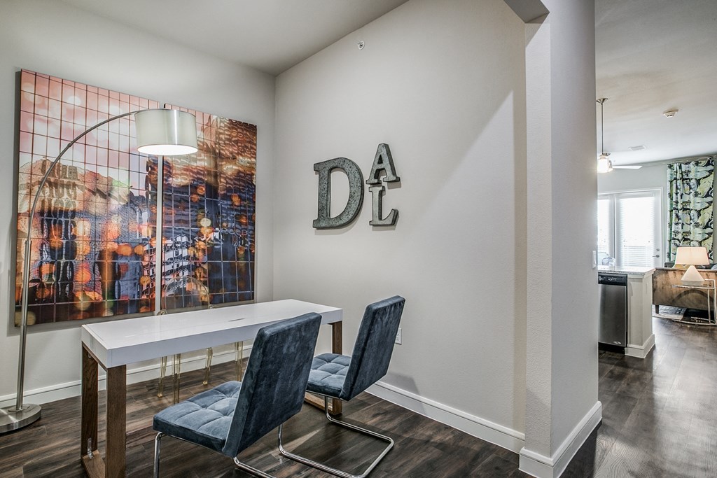 the residence on lamar apartment homes leasing office with desk and chairs