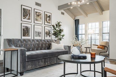 a living room with a couch and a table