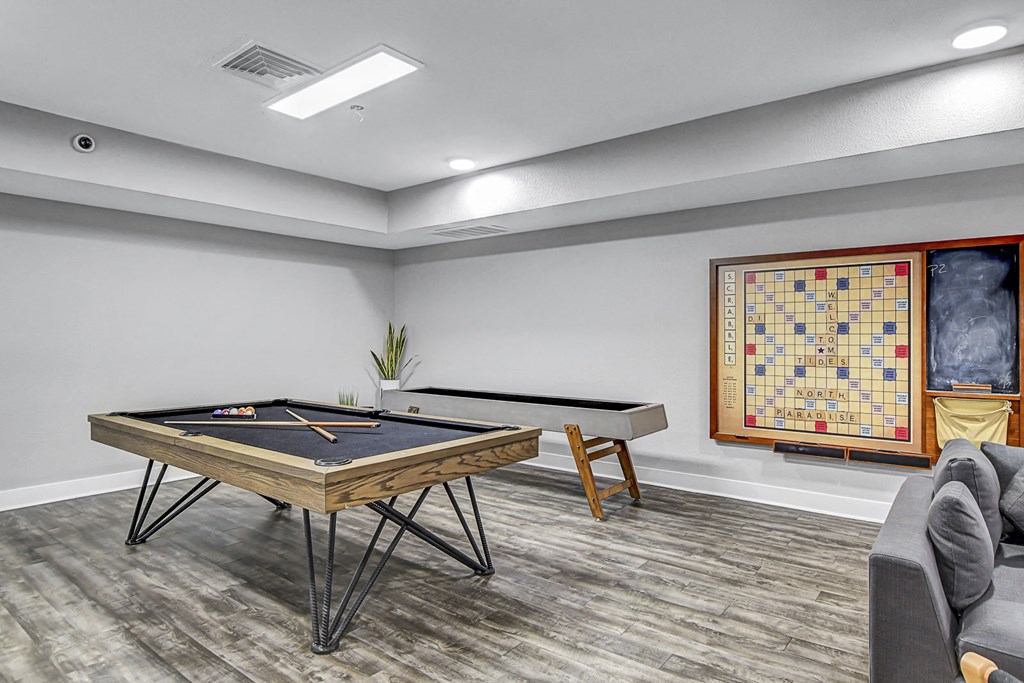 the retreat apartments l game room with pool table and foosball