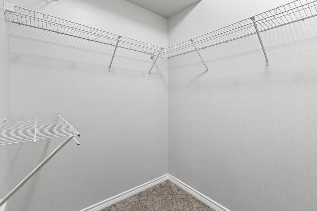 our spacious closets are equipped with shelves and hooks for hanging clothes
