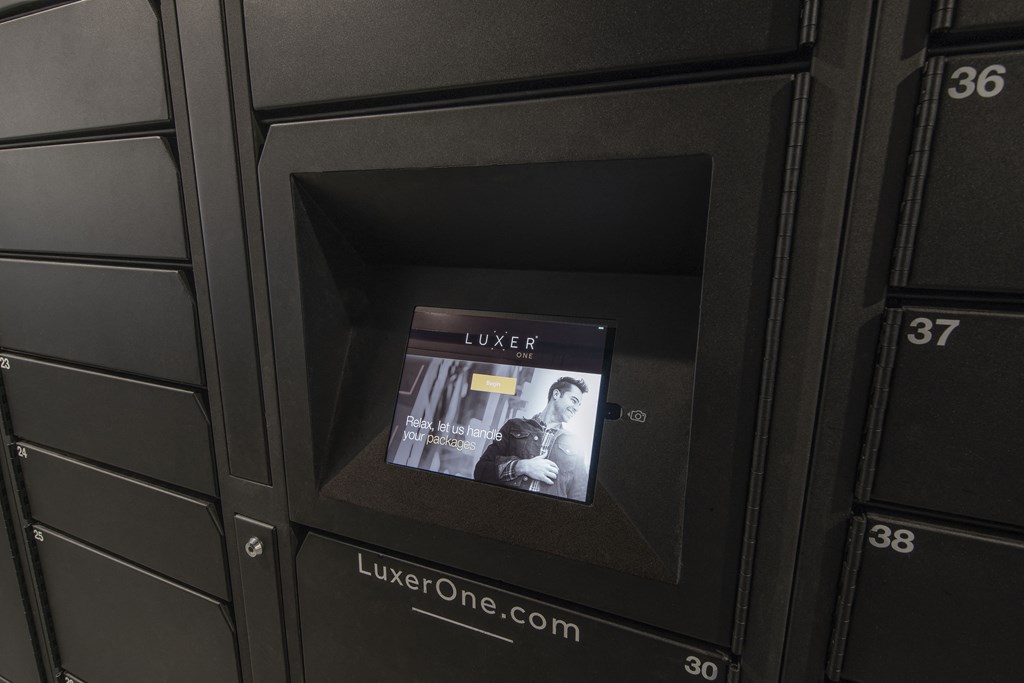 an image of a lockers with a dvd player in the middle