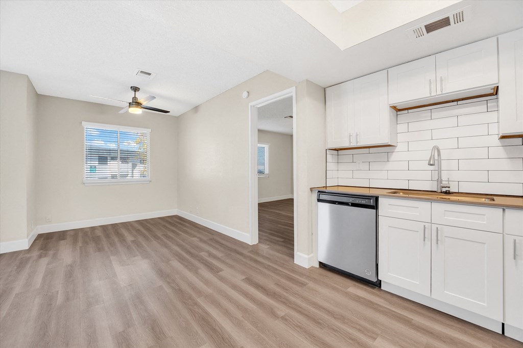 a kitchen and living room in a 555 waverly unit