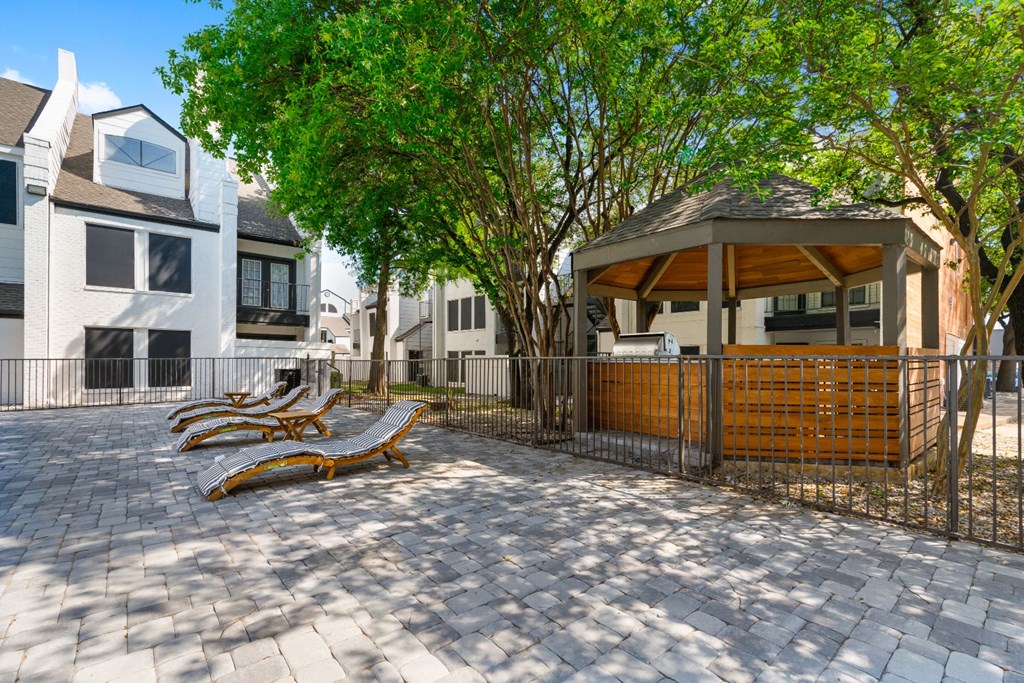 a park with a gazebo and benches