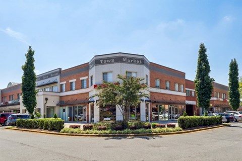 A large building with the words "Town Market" on the front.
