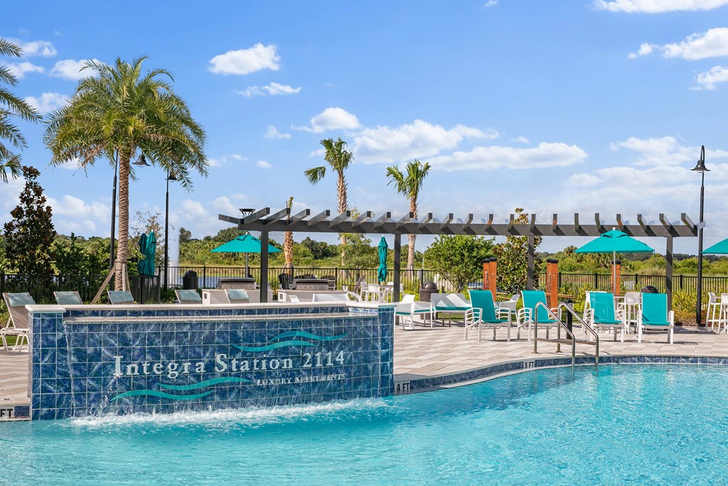 A pool with a sign that says "Integra Station 2114" on the side.