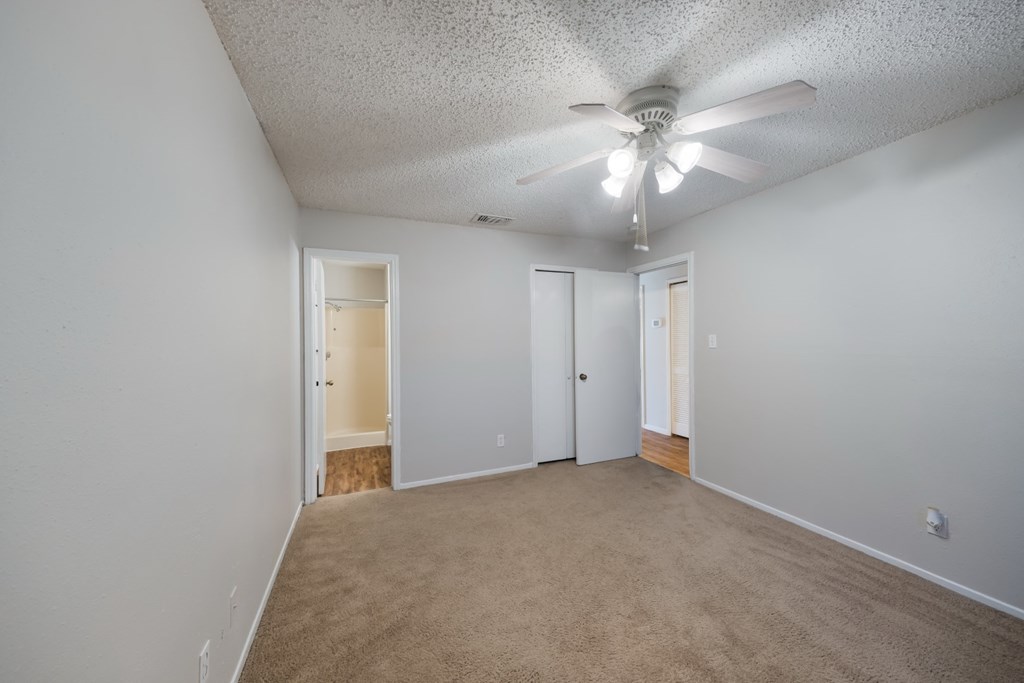 guest bedroom with carpet floors