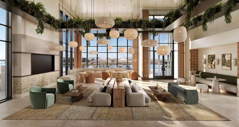 A modern living room with a large window overlooking the city.
