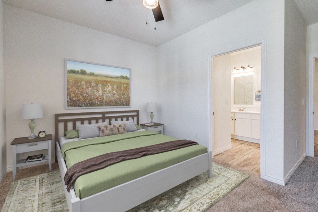 a bedroom with a bed and a bathroom with a closet