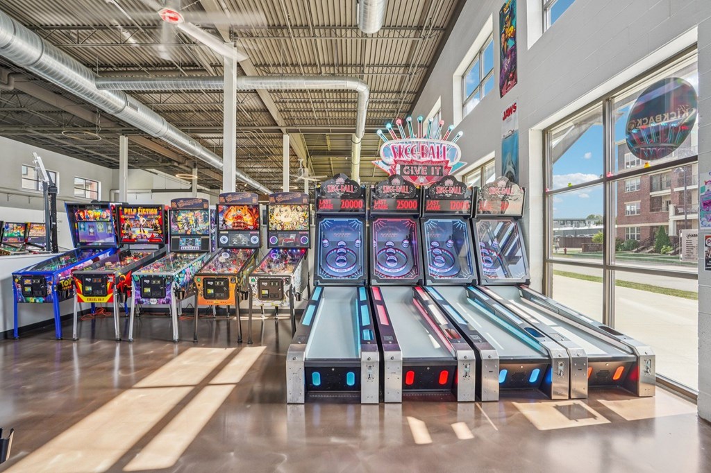 A bowling alley with a neon sign that says