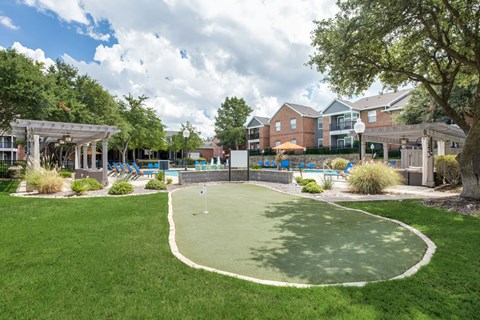 the preserve at ballantyne commons community yard with a mini golf court and pool