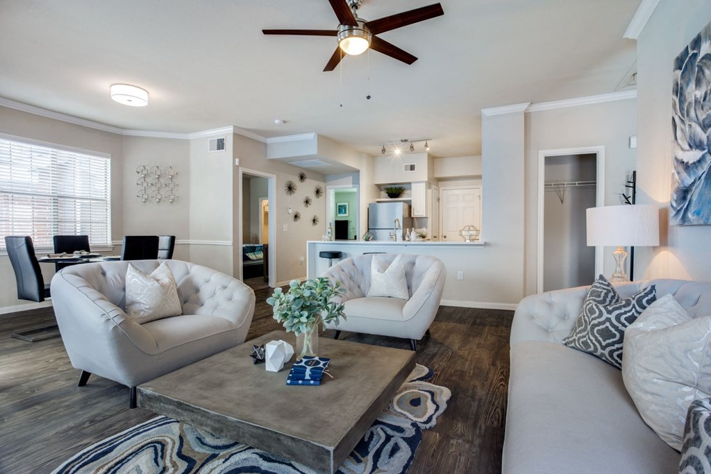 a living room with couches and a coffee table