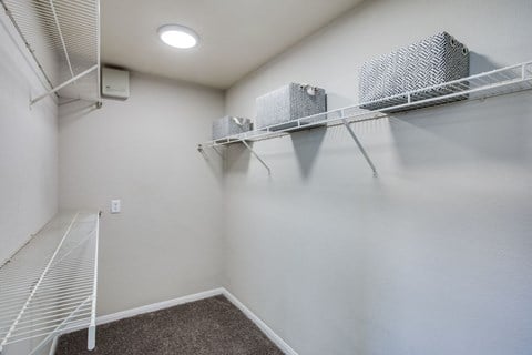 our spacious closets are equipped with shelves and racks for clothes