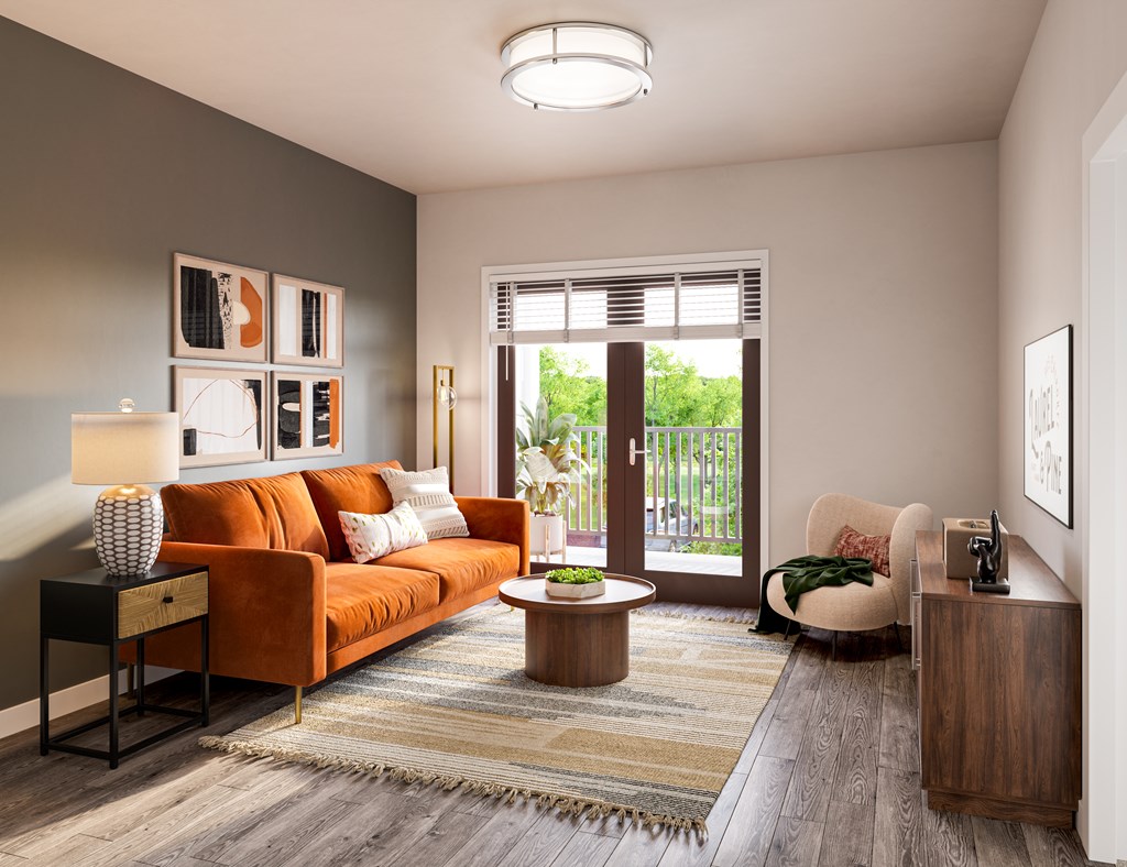 A living room with a couch, chair, and coffee table.