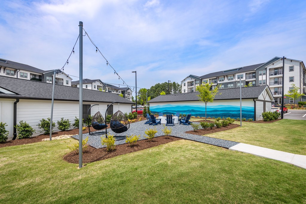 the preserve at ballantyne commons yard with swimming pool and building with apartments