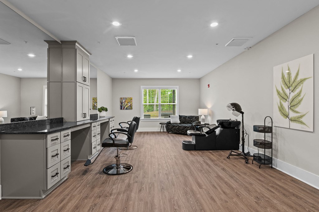 a living room with a kitchen and a couch