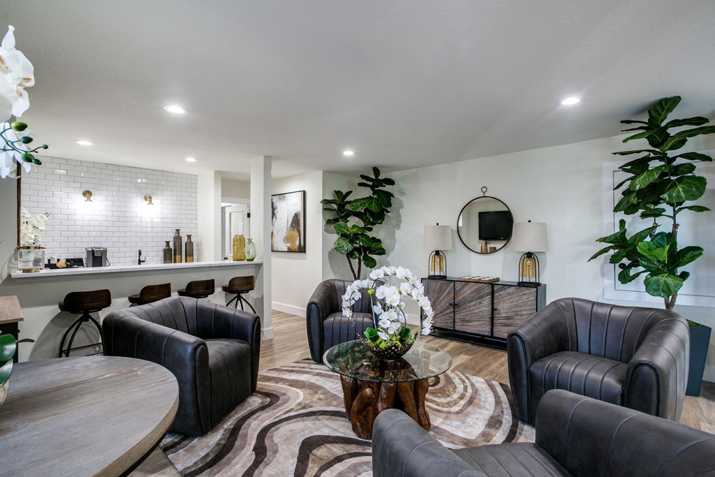 a living room with couches and a table