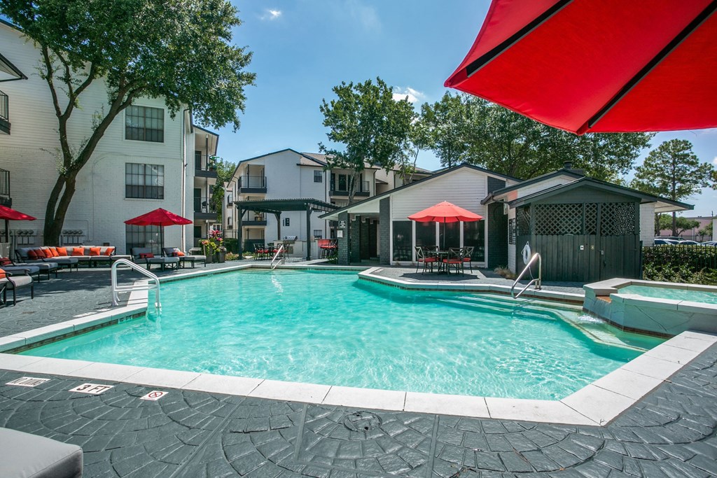 our apartments have a swimming pool and a patio with umbrellas