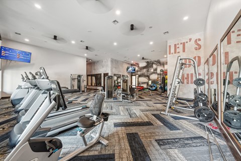 a gym with weights and other exercise equipments and a sign that reads left s