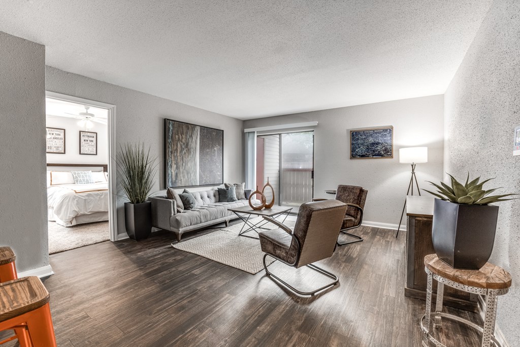 our apartments offer a living room with a couch and a table